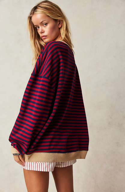 Moni® | Jersey oversize de rayas vibrantes con detalles