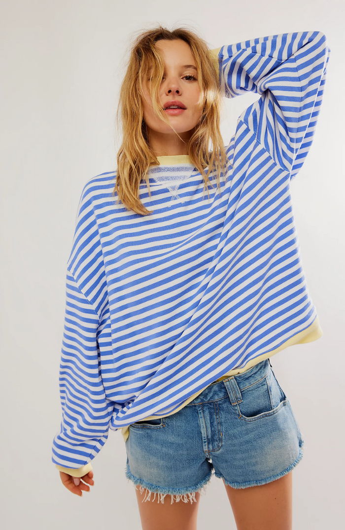 Moni® | Jersey oversize de rayas vibrantes con detalles