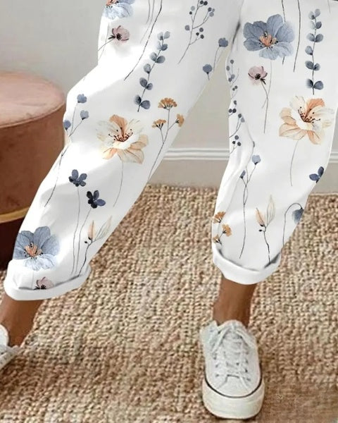 Elegante pantalón con cordón y estampado floral