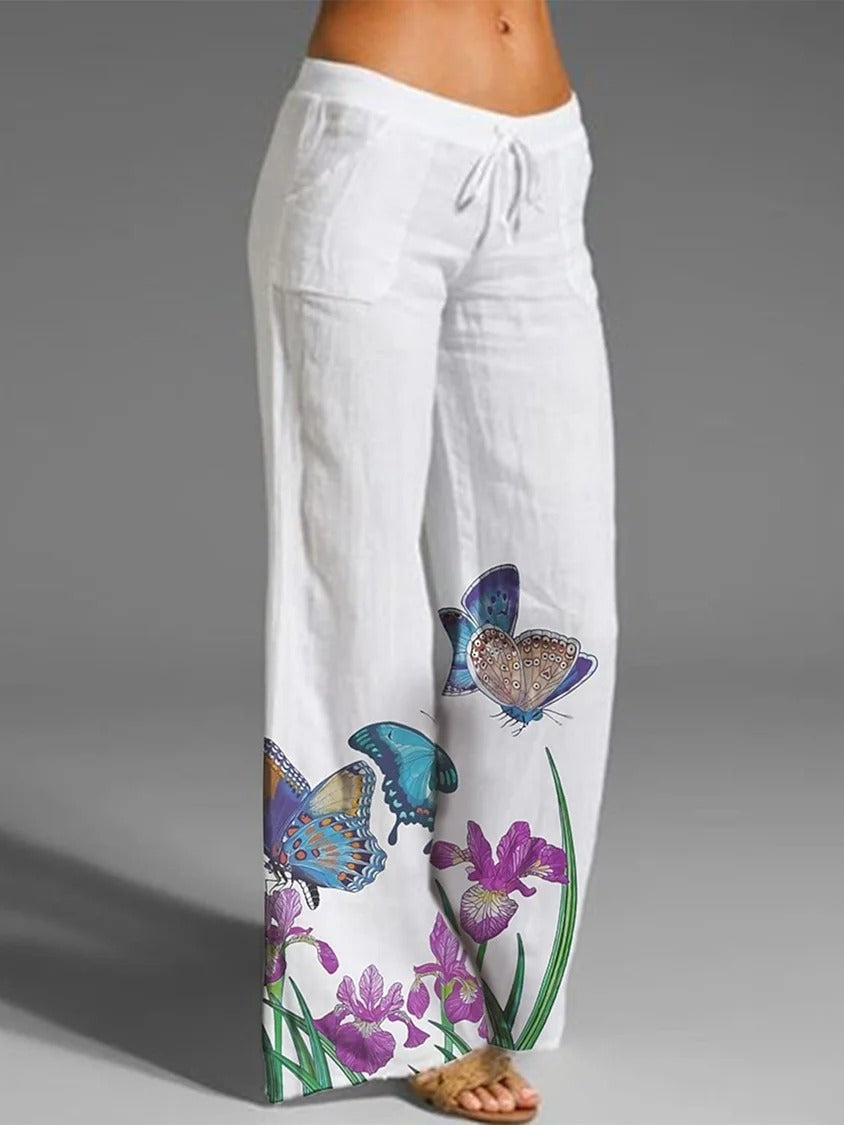 Pantalones blancos casuales con estampado de mariposas y bolsillos