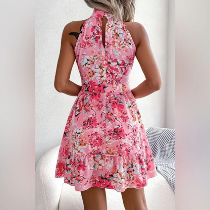 Tina - Vestido acampanado con dobladillo con volantes y cintura con lazo floral