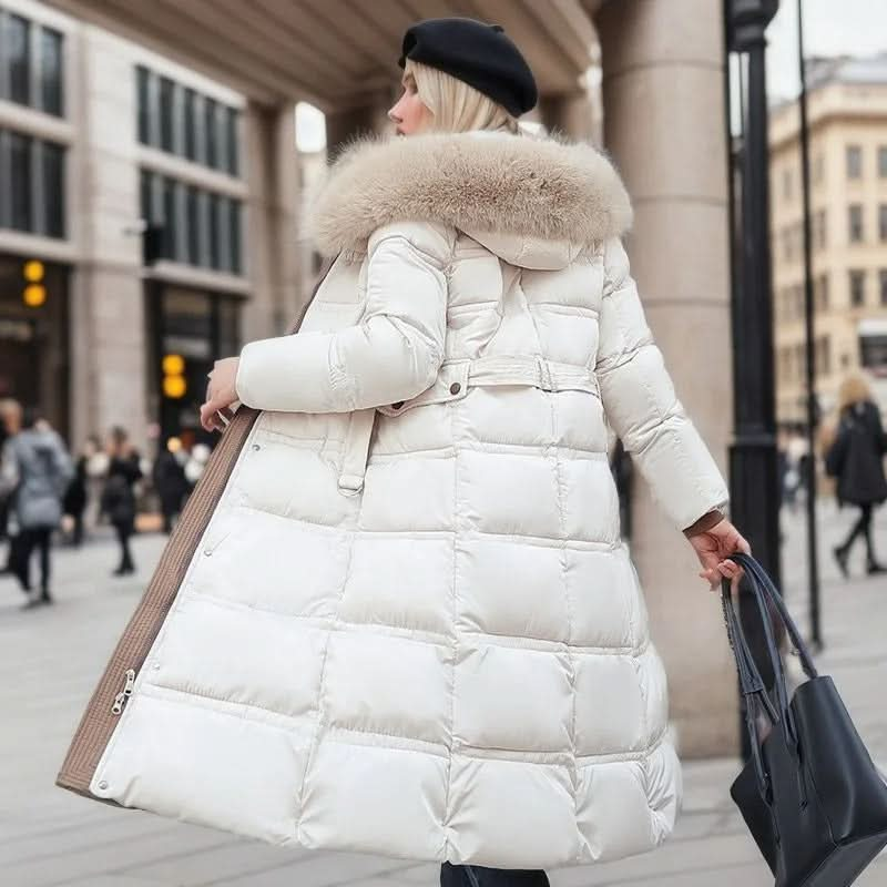 Zoé® | Elegante chaqueta acolchada con cuello de piel sintética y cinturón para mujer