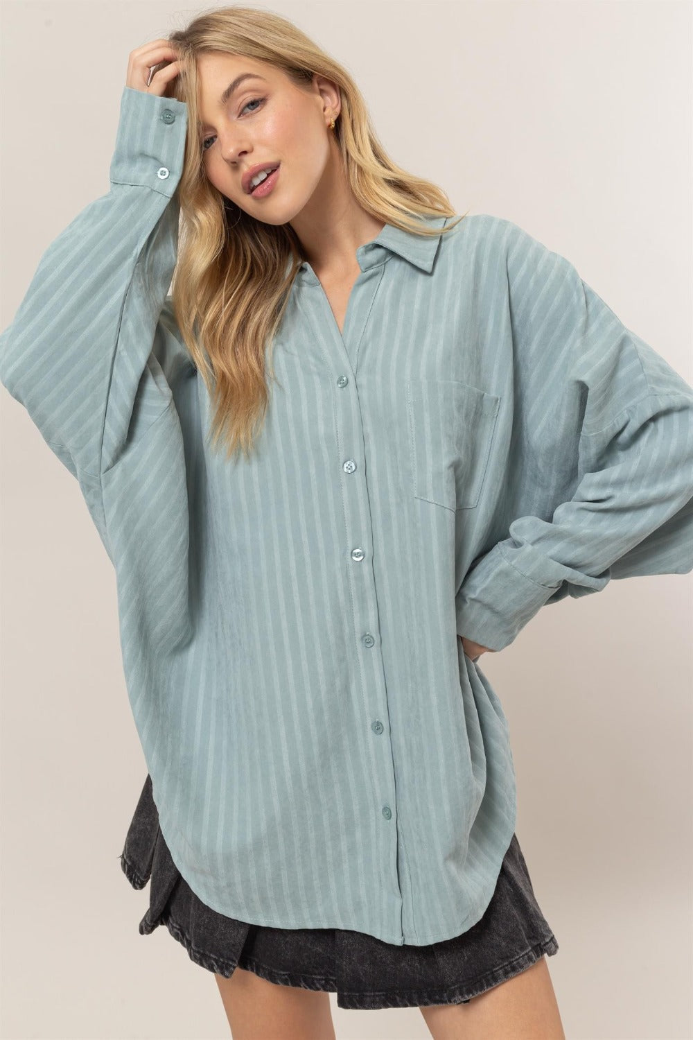 Teresa® | Camisa oversize con botones y manga larga a rayas