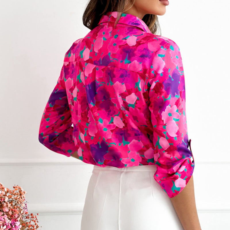 Xenia® | Blusa elegante con estampado floral.