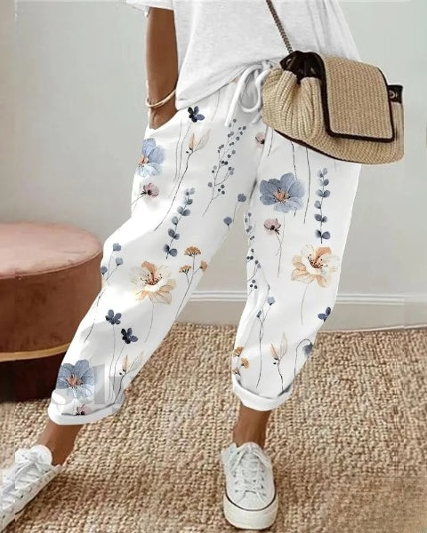 Elegante pantalón con cordón y estampado floral