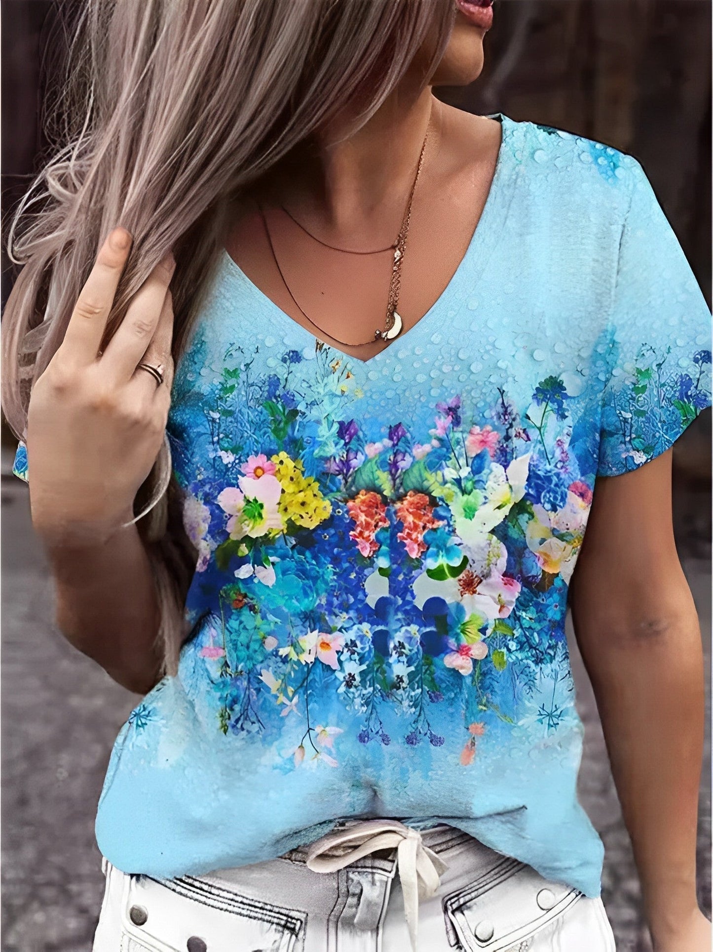 Camiseta de cuello en V con estampado floral